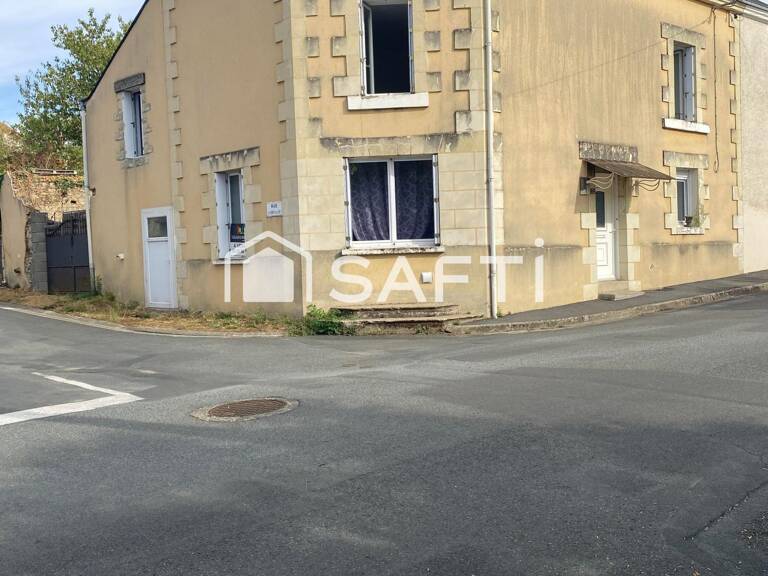 Maison de ville offrant de beaux potentiels — photo 1