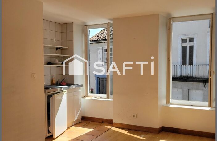 Immeuble à fort potentiel et local commercial avec studio. — photo 4