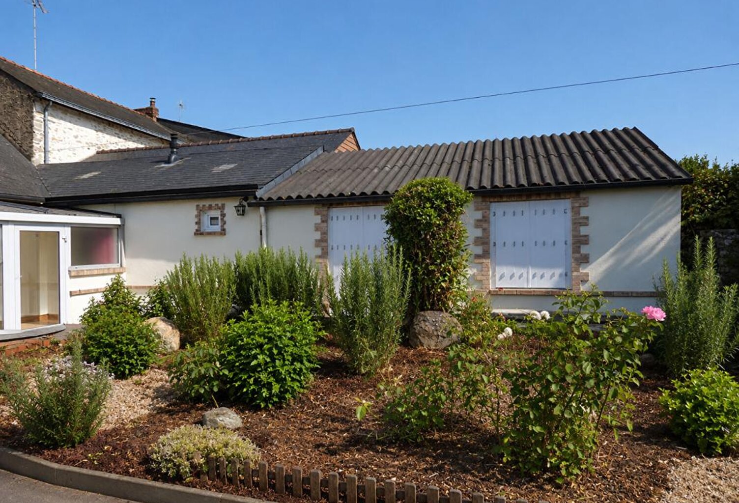 Maison avec jardin et 2 garages — photo 1