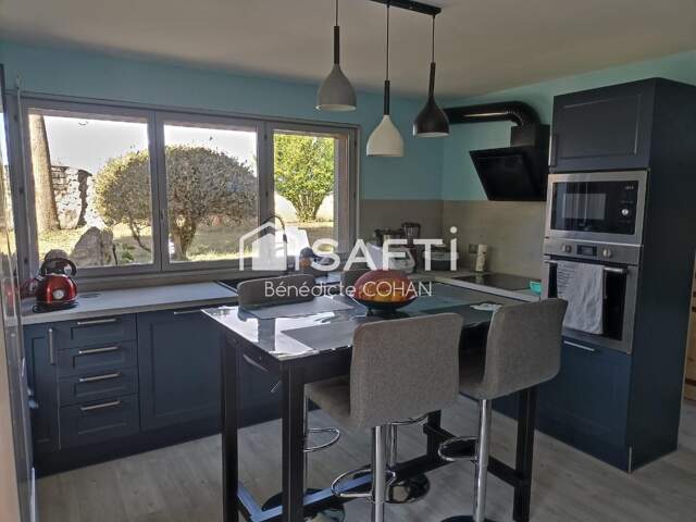 Belle maison alliant le charme de l'ancien et du moderne, 4 chambres, terrain et garage — photo du bien