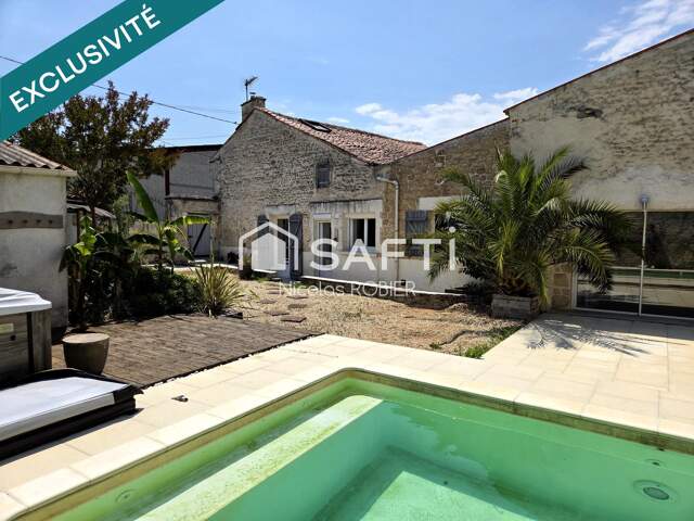 Lumineuse maison en pierre quatre chambres dont une en rdc, piscine, garage!! — photo du bien
