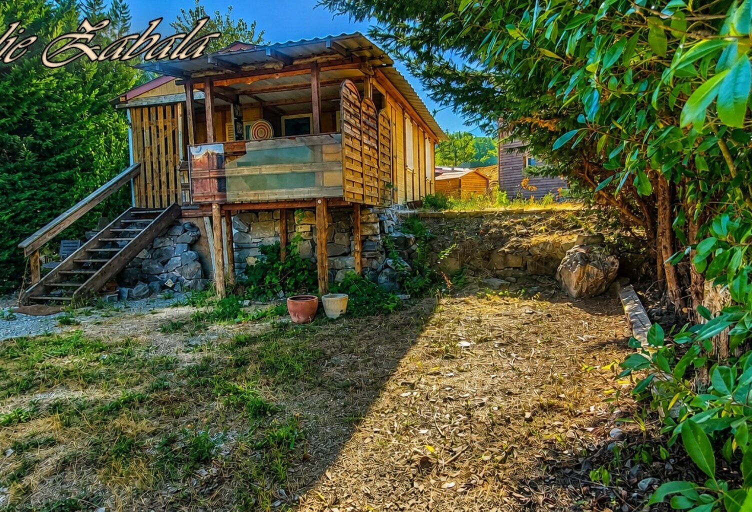 Bungalow en bois avec terrain privatif, terrasse et cave – PRL — photo 1