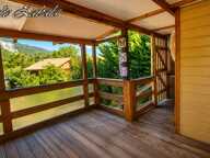 Bungalow en bois avec terrain privatif, terrasse et cave – PRL — photo 2
