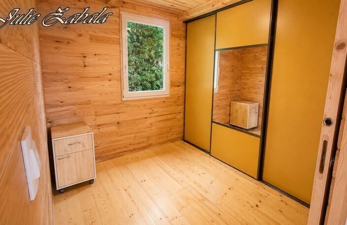Bungalow en bois avec terrain privatif, terrasse et cave – PRL — photo 5