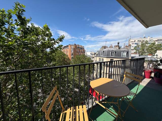 Paris 18e – Ordener / Marcadet – 6ème étage avec ascenseur, balcon-terrasse et vue dégagée — photo du bien