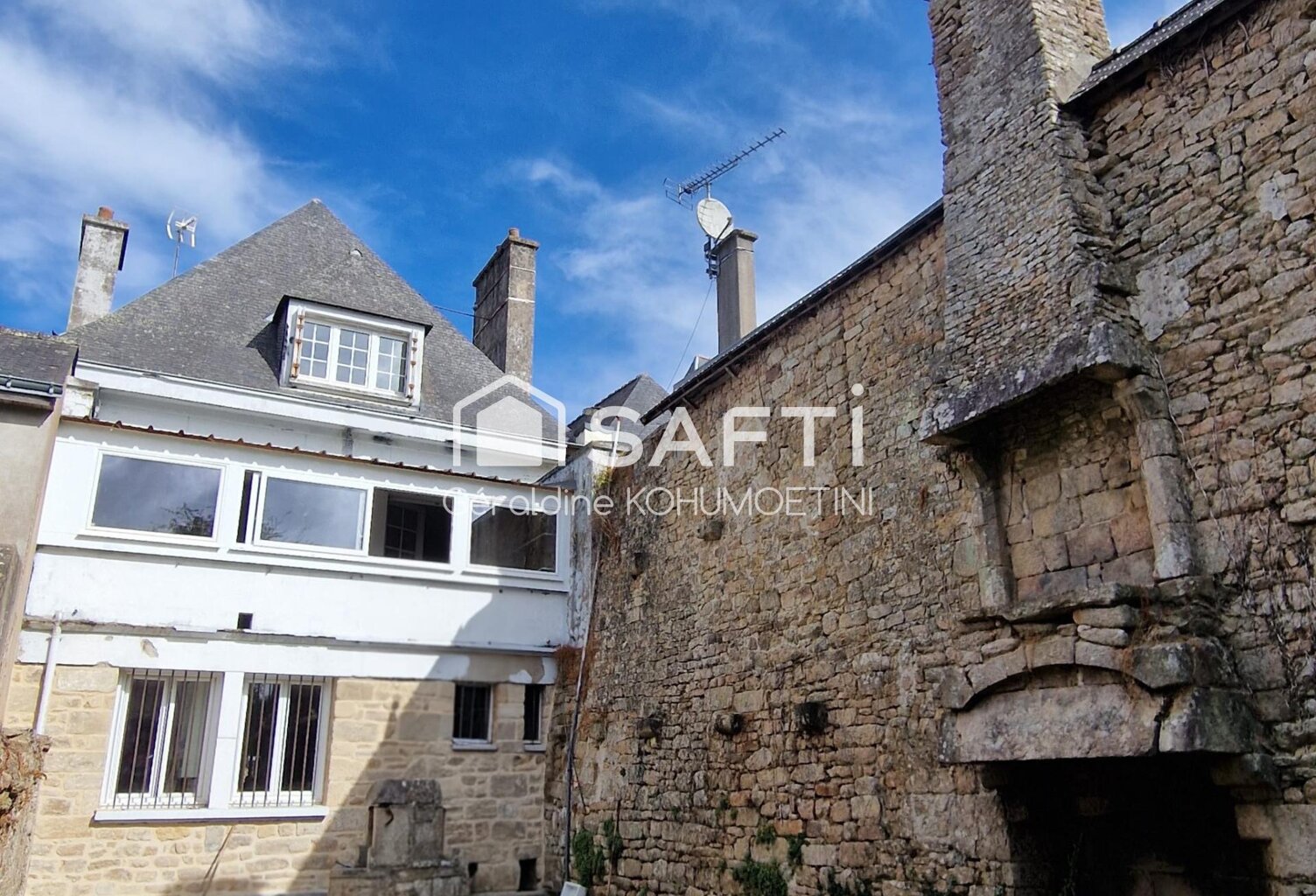 Immeuble mixte au cœur du bourg — photo 1