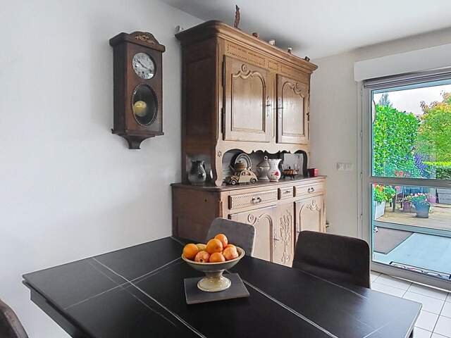 Appartement T2 avec véranda, terrasse, place de parking, carpot et garage à Saint-Ferjeux. Au calme. — photo du bien