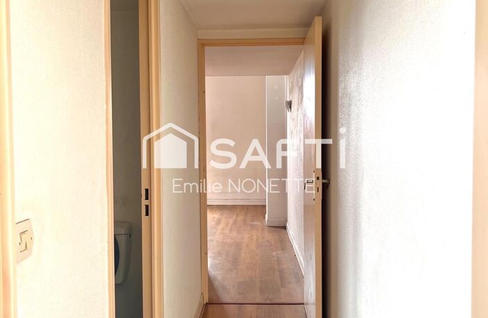Appartement T2 bis de 55m2 avec mezzanine au dernier étage d'un immeuble en pierre. — photo 4