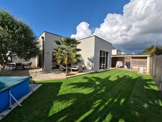 Superbe maison de plain pied  / 5 pièces 137 m2 sur terrain de 505 m² clos — photo du bien