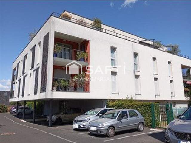T2 récent avec balcon, parking et vue jardin — photo du bien