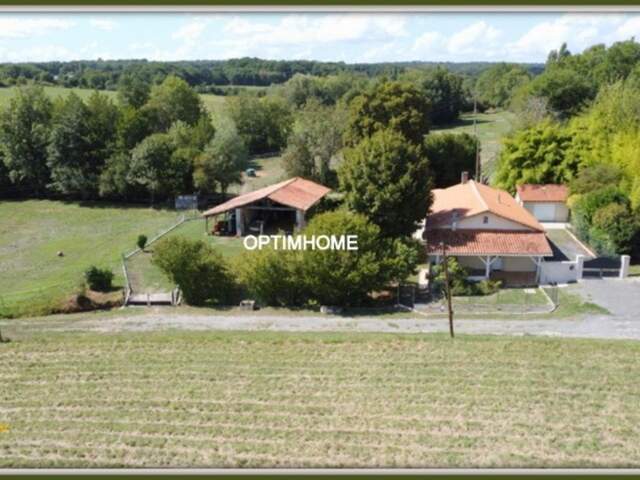 Ancien moulin rénové – 3,7 hectares au calme avec dépendances équestres — photo du bien