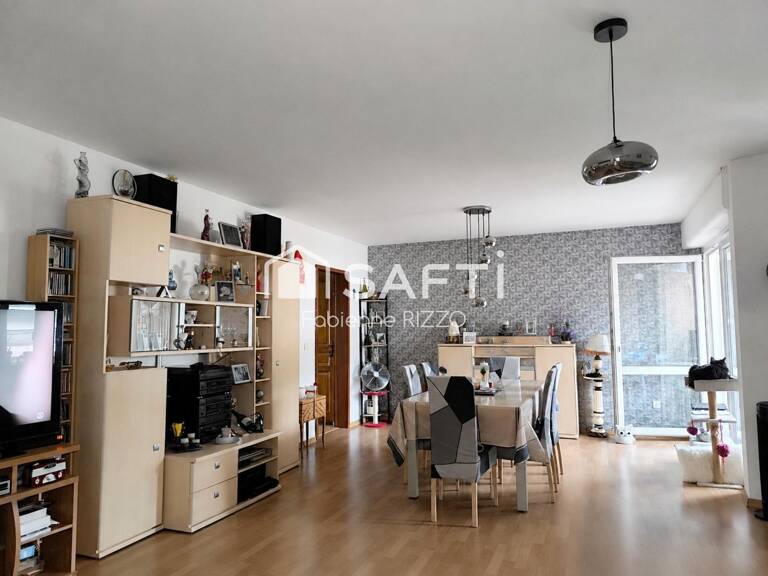 Appartement T3 de 90 m² vendu loué  Balcon  Parking couvert  Cave  Ascenseur — photo 1