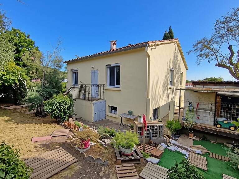 Ravissante maison individuelle 4 faces sur terrain arboré de 550m² avec sous sol complet de 100m² — photo 1
