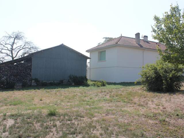 Maison familiale avec 3 000 m² de terrain, dépendance et sous-sol complet — photo du bien