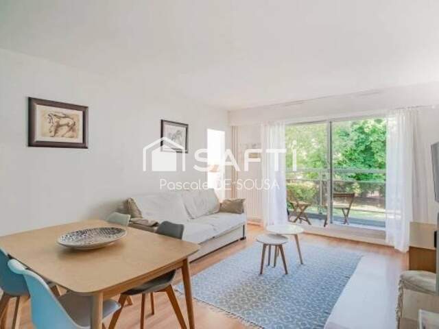 Appartement de 3 pièces avec balcon dans résidence verdoyante — photo du bien
