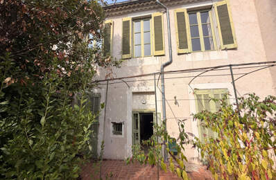 NIMES ARENES Maison de ville 7 pièces de 182 m2 avec jardin — photo du bien