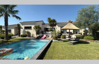 Maison de plain-pied avec piscine, jardin paysager et belles p — photo du bien