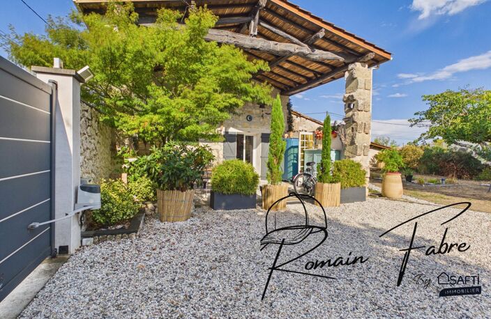 Maison en pierre de 131 m2 avec 3 chambres, grande terrasse couverte et arrière chai, au calme — photo 2
