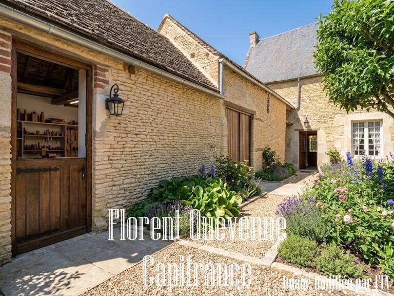 JORT – Maison de bourg en pierre avec dépendances et jardin — photo 1