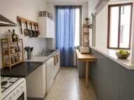 Immeuble de rapport avec 2 appartements, studio, caves et cour — photo 4