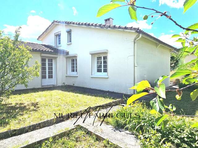 Maison T6 à Castelnaudary de 120m2, 4 CH, jardin, garage, DPE en D, proche commerce — photo du bien