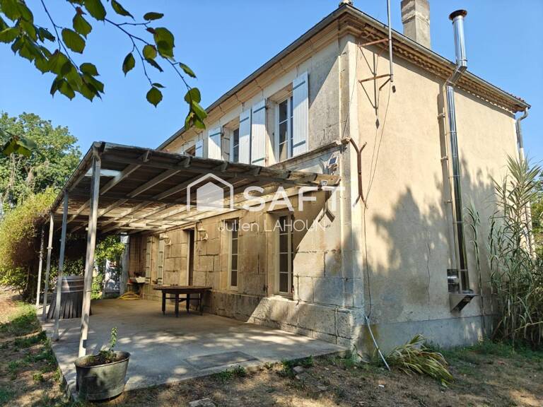 Ensemble immobilier avec deux maisons et terrain — photo 1
