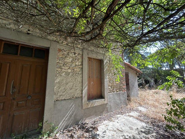 À Bram (11), maison en pierres apparentes à aménager sur un — photo du bien