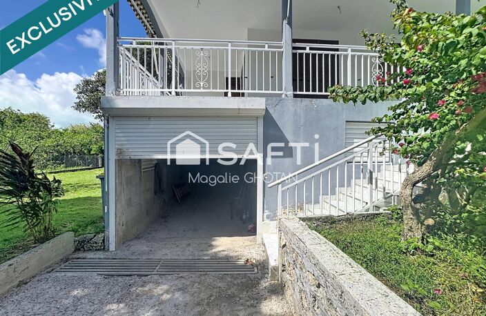 Maison de 3 chambres avec terrain clôturé de 1237m², garage et beaux volumes dans un secteur calme du Moule. — photo 2