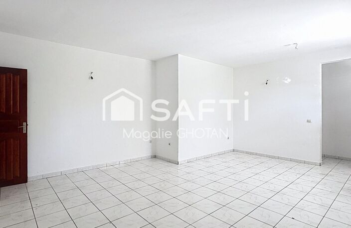 Maison de 3 chambres avec terrain clôturé de 1237m², garage et beaux volumes dans un secteur calme du Moule. — photo 3