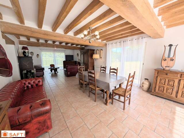 Une maison d'exception : pièce de vie de 50 m²,  3 suites + 3 chambres, dépendance — photo du bien