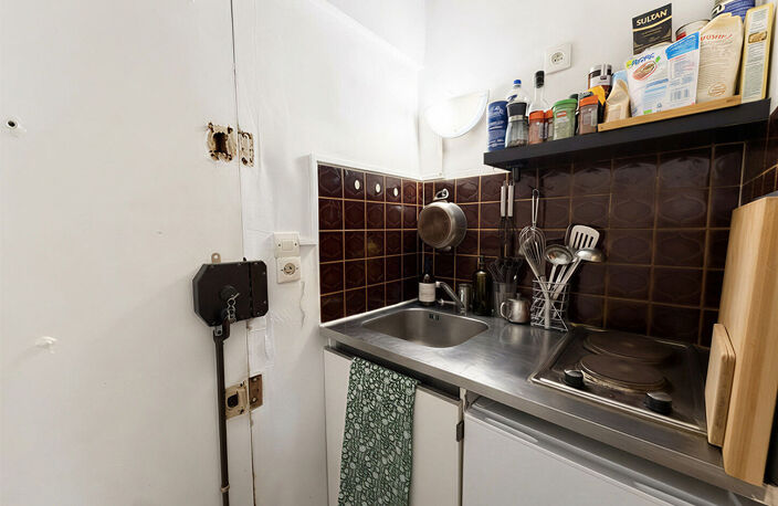 PARIS 2E - STUDIO 17,07 M² - VENDU LOUÉ — photo 4