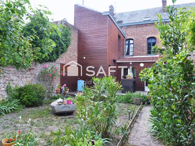 Rare en centre-ville : 173 m² habitables, DPE B, jardin et dépendance — photo du bien