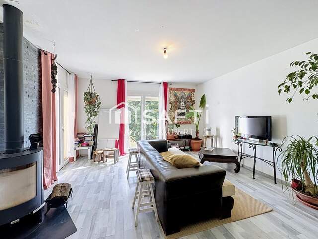 Maison T4 avec grand jardin arboré au calme — photo du bien
