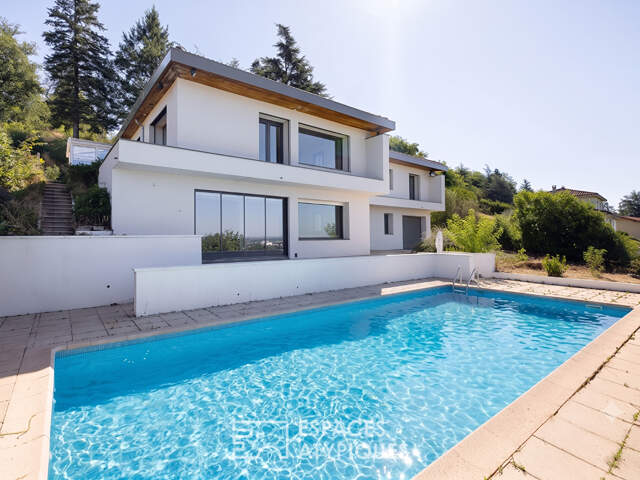Une architecture contemporaine ouverte sur un panorama d'exception — photo du bien