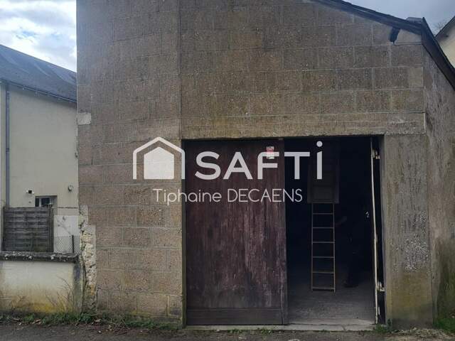 garage avec mezzanine, pouvant devenir un logement — photo du bien