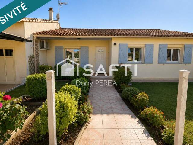 ? SAINT-LAURENT-D'AIGOUZE  Maison de plain-pied 100 m², 3 chambres, jardin et garage. — photo du bien