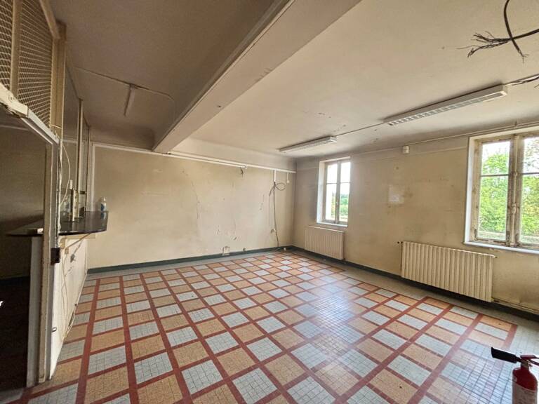 À vendre – Habitation avec local commercial, emplacement privilégié CUFFY (18) — photo 1