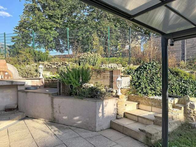 Maison rénovée de 93,68 m² avec jardin, terrasse, garage — photo du bien