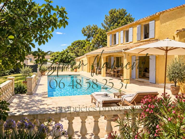 Maison familiale avec piscine ,forage, chambre de plain-pied et terrain de 1 600 m² à Saint-Hilaire-de-Brethmas — photo 1
