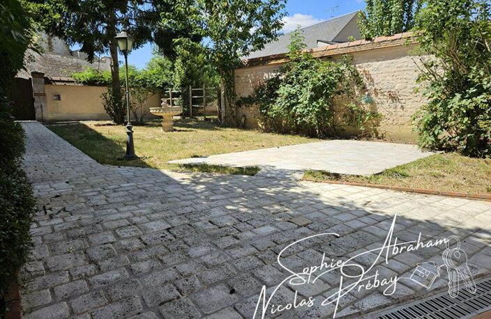 Maison en pierres avec jardin et double garage, proche centre-ville — photo 2