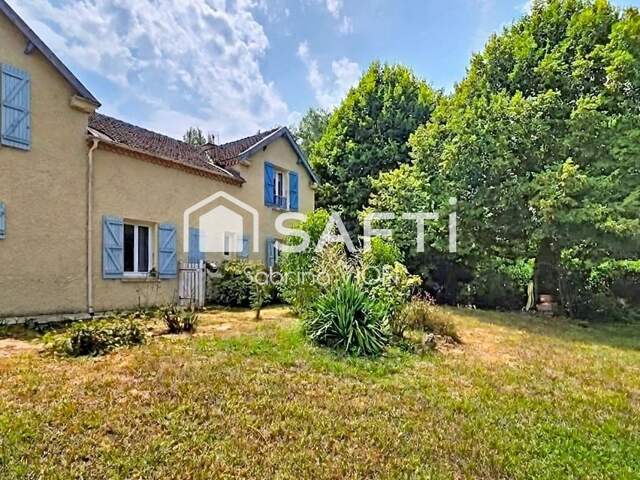 MAISON AVEC JARDIN ET GARAGE — photo du bien