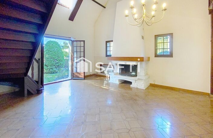Maison Familiale individuelle- Grand salon / séjour donnant sur jardin — photo 5