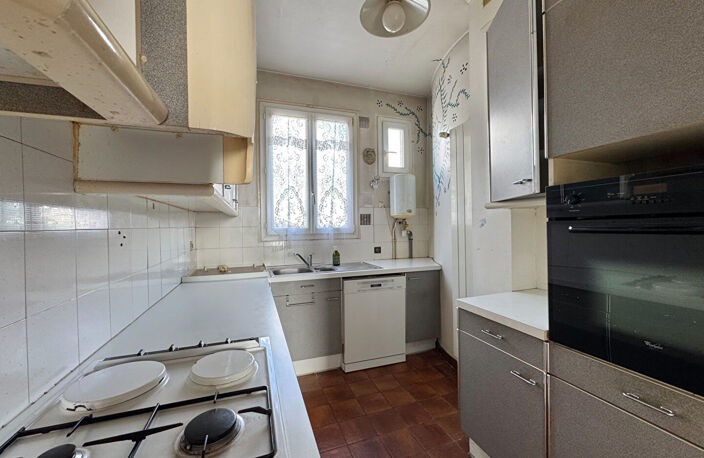 ASNIÈRES DUPLEX  DE 145 M² AU SOL À MODERNISER — photo 4