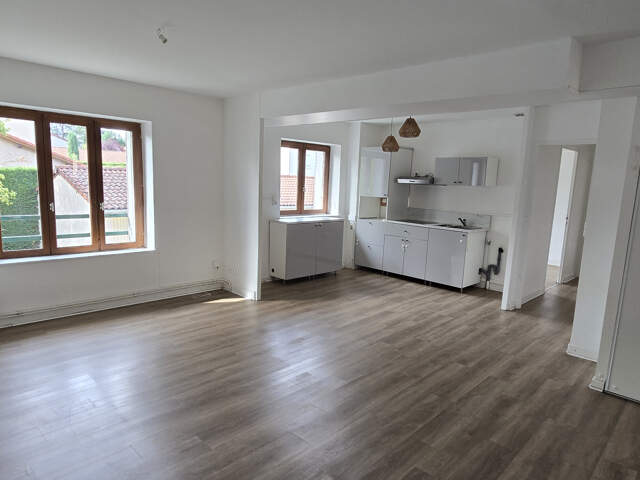 Appartement T4 de 76,3 m2 à L'ARBRESLE — photo du bien