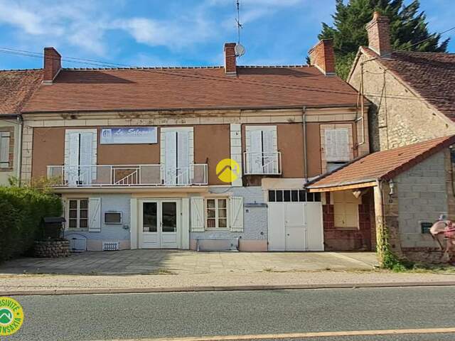 Appartement + commerce — photo du bien