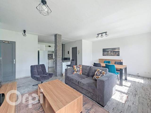 Appartement traversant, lumineux, entièrement rénové, environnement très calme, une cave et un box privatif sécurisé — photo du bien