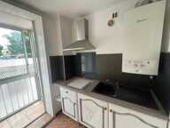 QUARTIER SUD APPARTEMENT 2 PIECES UNE CHAMBRE BALCON CAVE VUE DEGAGEE PARKING COLLECTIF — photo 2