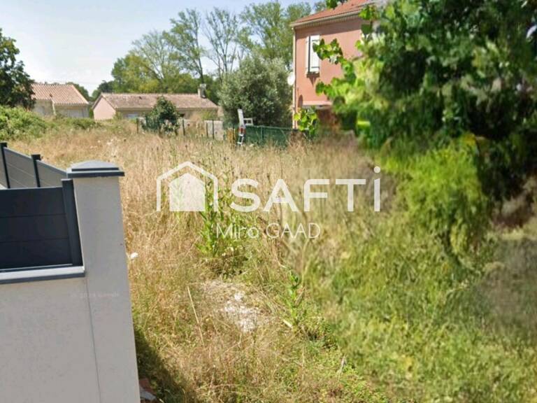 Terrain 400m2 viabilisé à bâtir au centre — photo 1