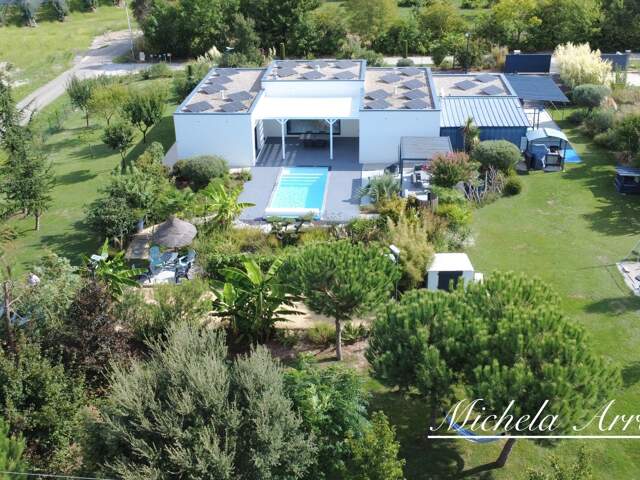 UNE VILLA CONTEMPORAINE OÙ LE QUOTIDIEN PREND UN AIR DE VACANCES-LE TEMPLE SUR LOT (47) — photo du bien