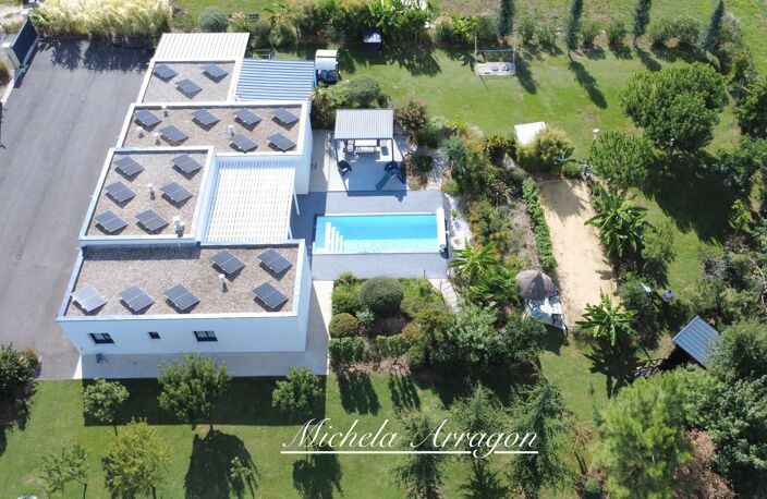 UNE VILLA CONTEMPORAINE OÙ LE QUOTIDIEN PREND UN AIR DE VACANCES-LE TEMPLE SUR LOT (47) — photo 2